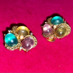 Vintage clip on earrings with blue, pink, yellow, and gold tones